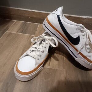 Court legacy leather Nike shoes.